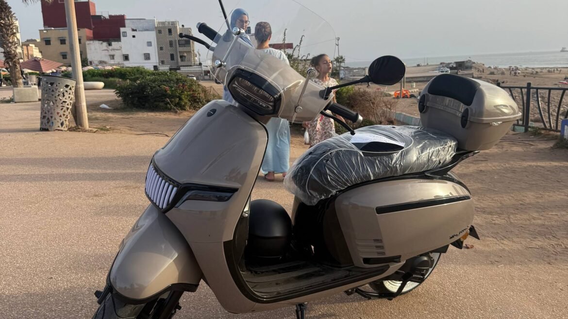 Mojito S 49cc scooter for rent in beige with LED grille, windshield and top case, Tamraght beach